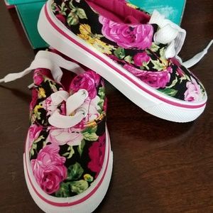 NWB cute floral sneakers! Runs a size small